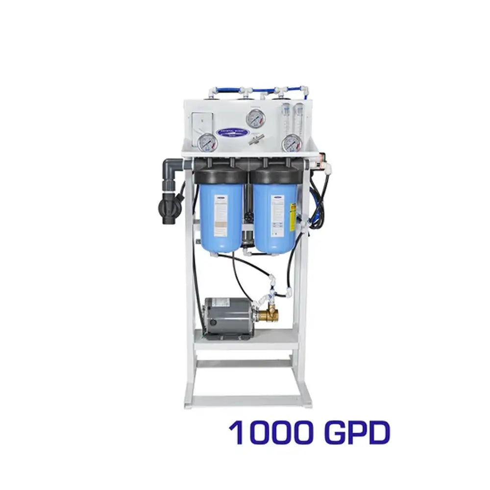 Crystal Quest 1,000 GPD standalone whole house reverse osmosis system featuring blue pre-filters, pressure gauges, and a stainless steel frame.