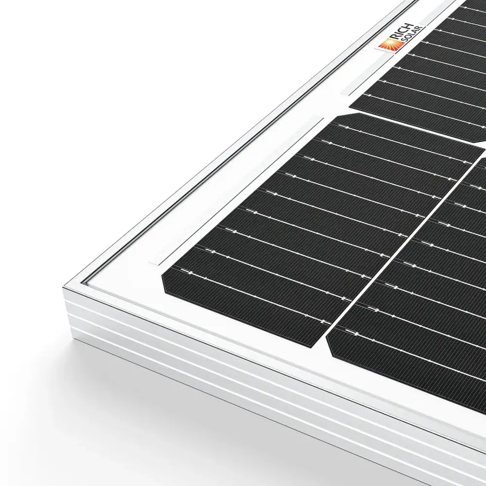 Close-up view of the corner grid design and anodized silver aluminum frame of a Rich Solar 100W monocrystalline solar panel.