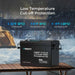 Renogy Core Mini 12V 200Ah deep cycle lithium battery displayed in a snowy winter camping environment, highlighting its built-in low-temperature cut-off protection.