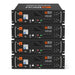 A stack of four Rich Solar Alpha 5 Pro 5120Wh lithium server rack batteries (51.2V 100Ah) forming the energy storage bank for the off-grid system.