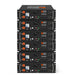 Vertical stack of six Rich Solar Alpha 5 Pro 51.2V 100Ah server rack lithium iron phosphate (LiFePO4) batteries for energy storage.