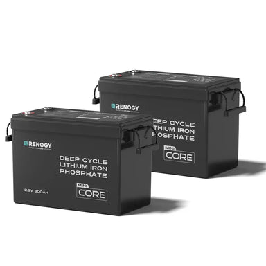Two Renogy Core Mini 12V 300Ah deep cycle lithium iron phosphate batteries with built-in carrying handles, shown side-by-side on a isolated white background.