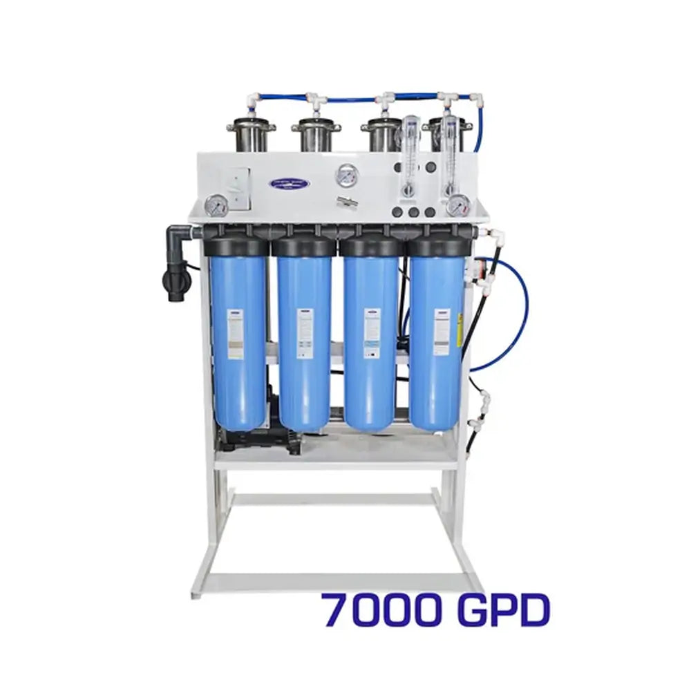 High-capacity 7,000 GPD Crystal Quest industrial-grade whole house RO system with four blue filter stages and multiple membrane housings.