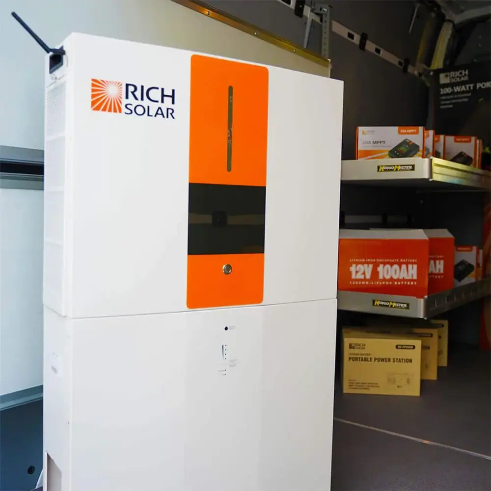 Rich Solar RS-A10 6.5kW All-in-One Energy Storage System inverter with orange accent panel installed in a mobile application setup.