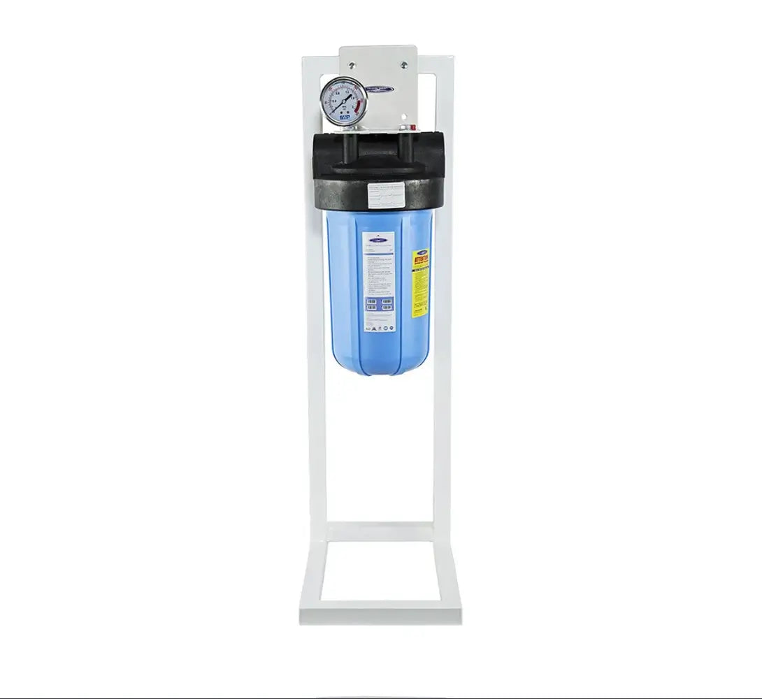 Crystal Quest single canister alkalizing water filtration system on a white floor stand with a pressure gauge.