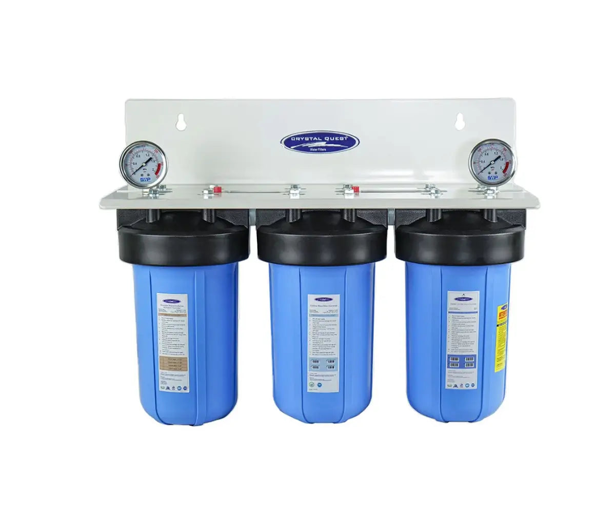 Crystal Quest triple canister wall-mounted alkalizing water filtration system for residential water treatment.