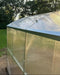 Detailed view of the roof peak and galvanized steel connectors on a GreenhouseToGrow Magnolia 10x39 Greenhouse Kit.
