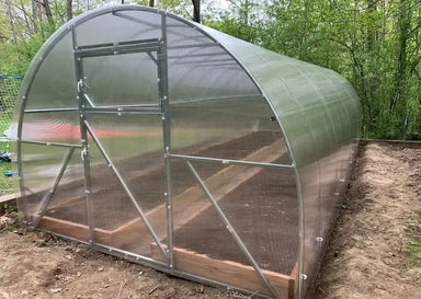 Clear front-facing view of the GreenhouseToGrow Camellia 10x19.5 Greenhouse Kit showing the heavy-duty galvanized steel frame and door assembly.