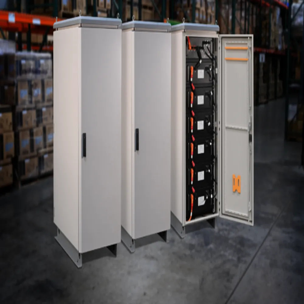 Multiple AIMS Power lithium battery cabinets in warehouse, including one open 230V cabinet with stacked LiFePO4 modules.