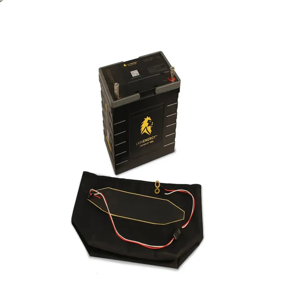 Lion Energy Safari UT 700 battery with UT1300 Battery Warmer components laid out beside it, including insulated wrap and heating pad accessory kit