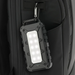 Lion Energy Lion Cub power bank with built-in LED light on backpack