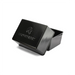 Black metal Lion Energy Faraday-style storage box with fitted lid and embossed Lion Energy logo, shown open in a minimalist studio product image on a light gray background