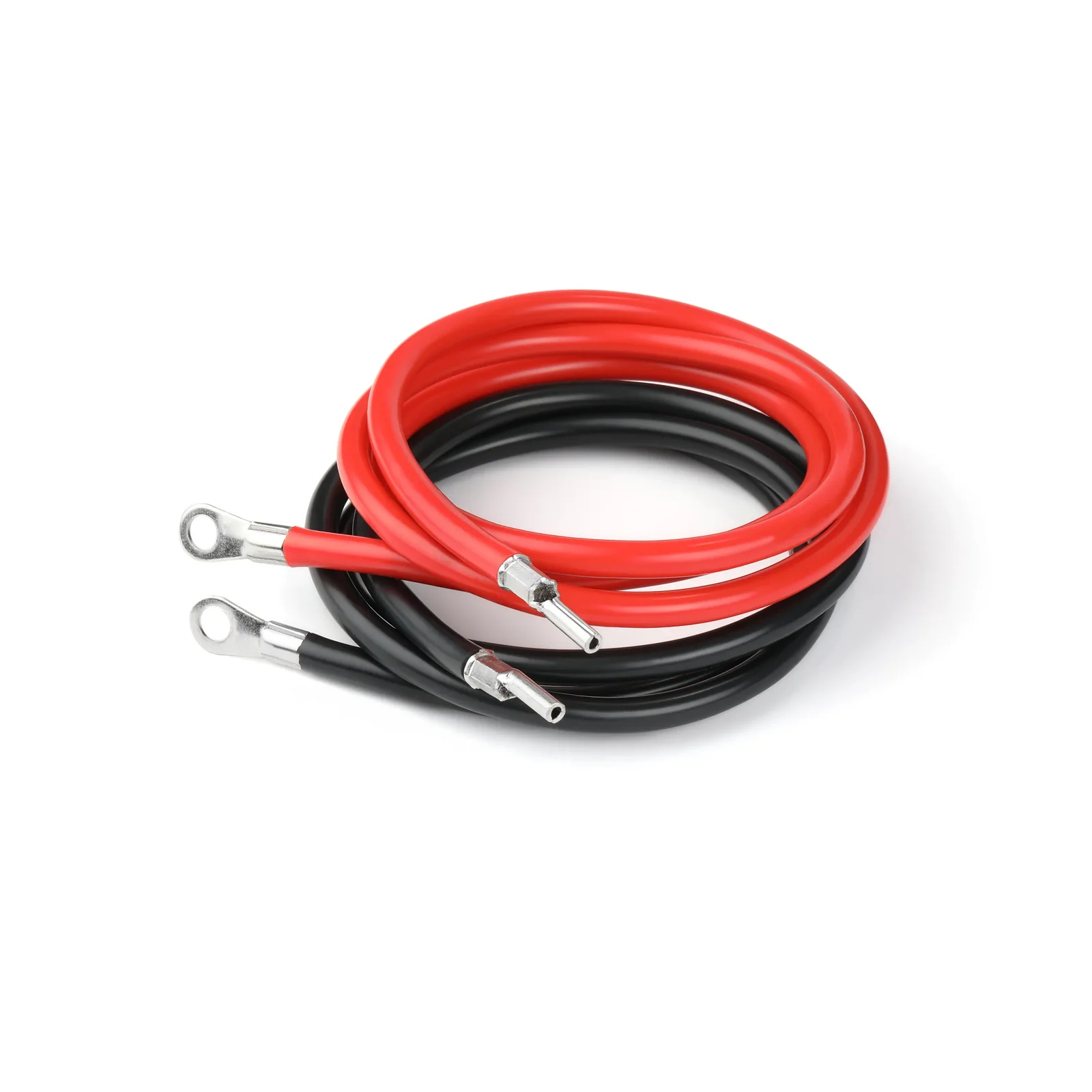 Coiled red and black battery charger cables with metal ring terminals and connector ends, shown in a studio close-up on a light gray background