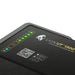 Close-up of the Lion Energy UT 1300 BT-H battery top panel showing green charge indicator lights, Bluetooth icon, QR code, and app store badges