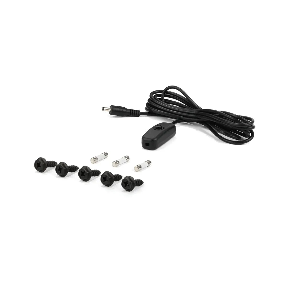 Savanna IV inverter accessories including black inline remote cable, mounting screws, and glass fuses displayed separately on a light gray background