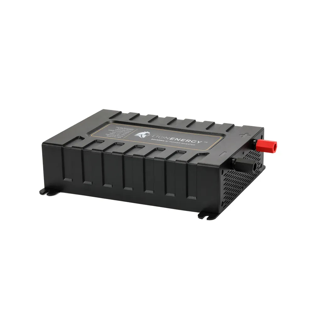 Three-quarter product shot of the Lion Energy Savanna IV power inverter showing the rugged black housing, terminal posts, vented side, and top label reading “Lion Energy Savanna IV Power Inverter”