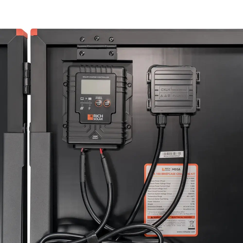 Close-up of pre-mounted Rich Solar 10Amp 12Volt solar charge controller, junction box, and technical specifications label.