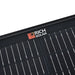 Macro detail view of high-efficiency monocrystalline solar cells and the Rich Solar logo badge on the protective frame.