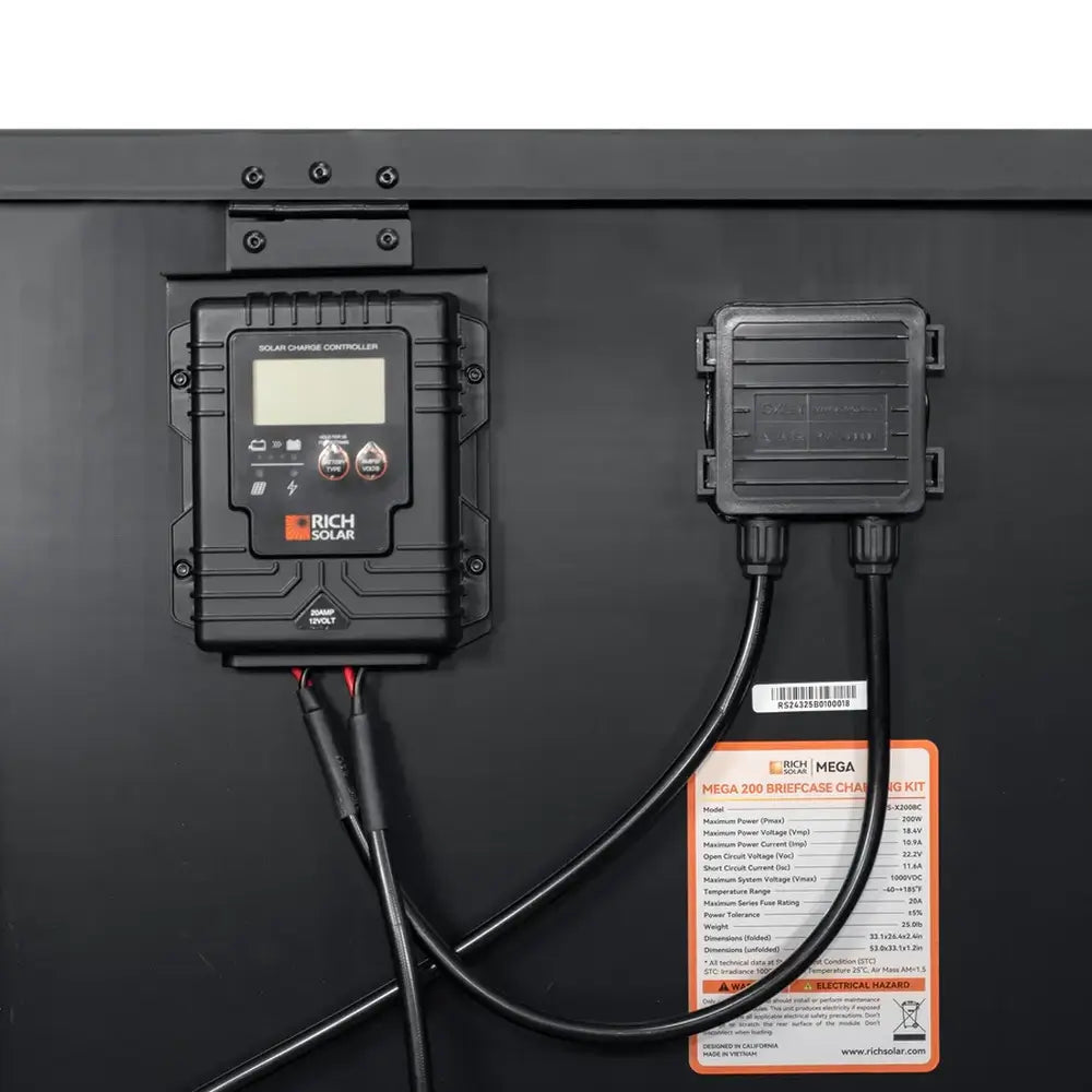 Detailed close-up of the back panel of a Rich Solar MEGA 200 briefcase including the digital solar charge controller, junction box, and product specification label.