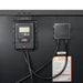 Detailed close-up of the back panel of a Rich Solar MEGA 200 briefcase including the digital solar charge controller, junction box, and product specification label.