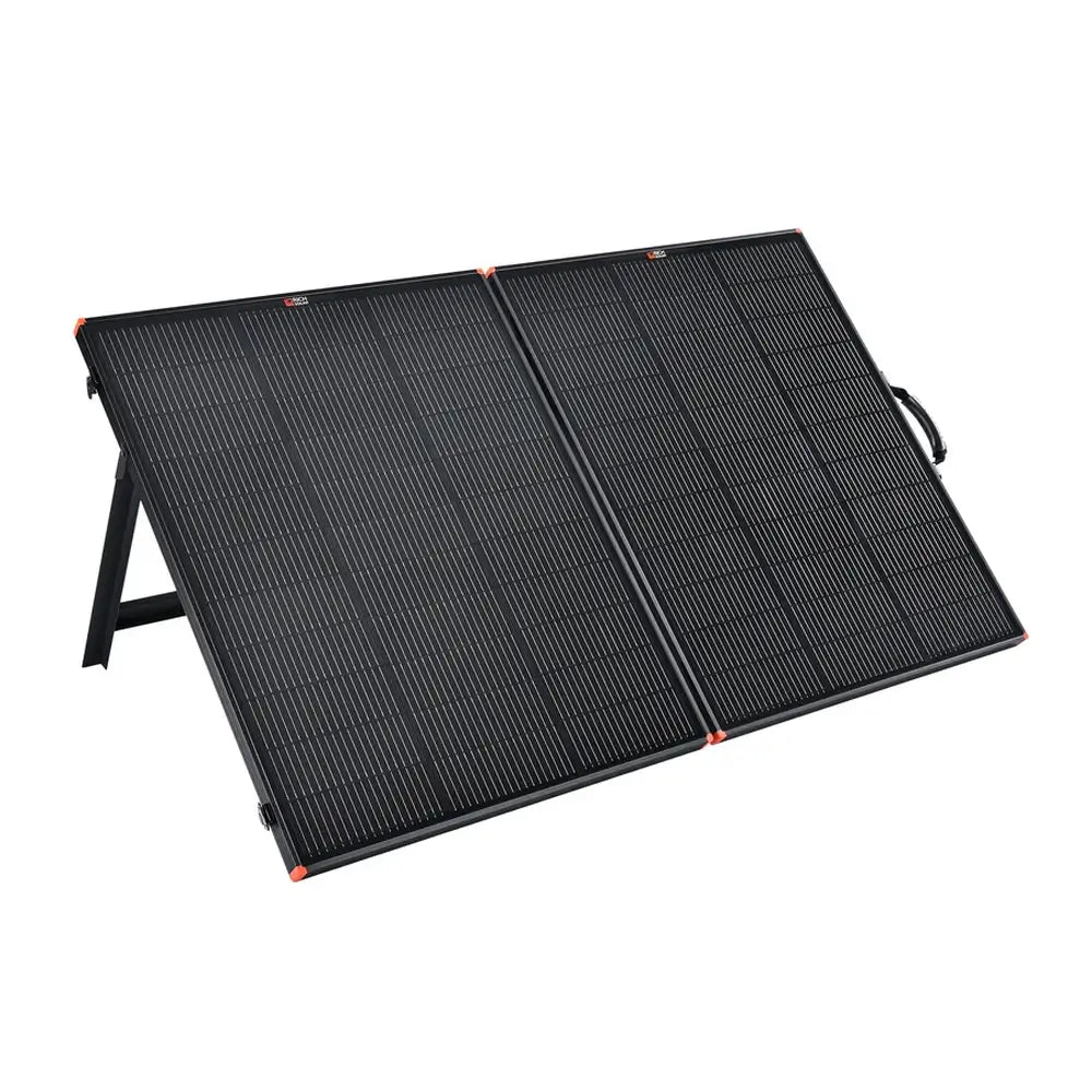 Angled view of the unfolded Rich Solar MEGA 200W briefcase solar panel propped up by its integrated kickstands.