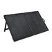 Angled view of the unfolded Rich Solar MEGA 200W briefcase solar panel propped up by its integrated kickstands.