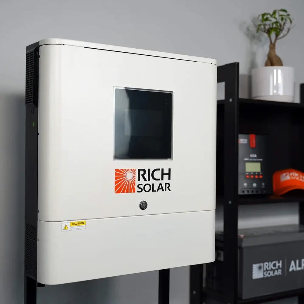 Angled studio shot of the Rich Solar NOVA 6500S hybrid solar inverter mounted next to equipment storage shelves.