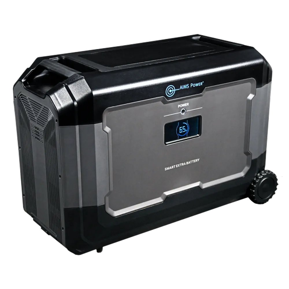 AIMS Power AIO-5KWHBAT extender battery with rugged black and gray housing, side wheel, power button, and blue LCD showing 65% charge.