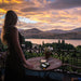 Lion Energy Prowler 20,000mAh power bank charging phone at sunset