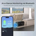 Smartphone displaying the My Renogy app for real-time Bluetooth battery monitoring next to a Renogy Core 12V 200Ah LiFePO4 battery tucked under a camper van bench seat.