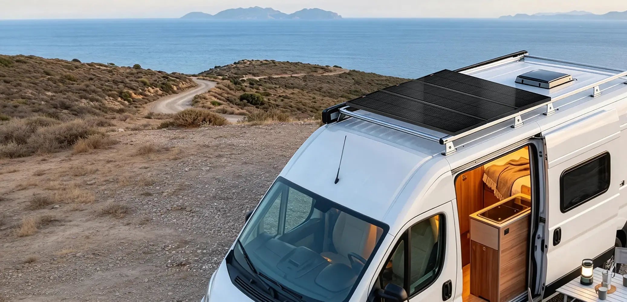 Off-grid camper van parked by the ocean featuring three Rich Solar Mega 100 Slim solar panels mounted on the roof rack.
