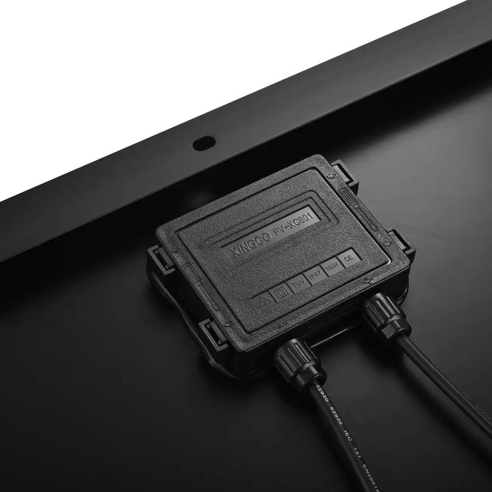 Close-up of the waterproof junction box on the back of the Rich Solar MEGA 200W solar panel.