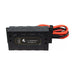 Side product view of Lion Energy Savanna CC controller with attached red and black cable set, compact black charge controller for solar battery systems