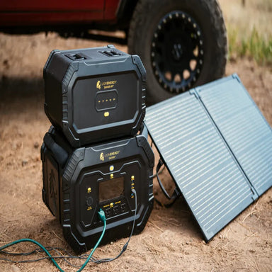 Lion Energy Safari 3000W portable power system with solar panel outdoors