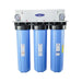 Triple-stage Crystal Quest Big Blue Whole House Water Filter on a white metal stand for 1-2 people, featuring alkalizing filtration technology.