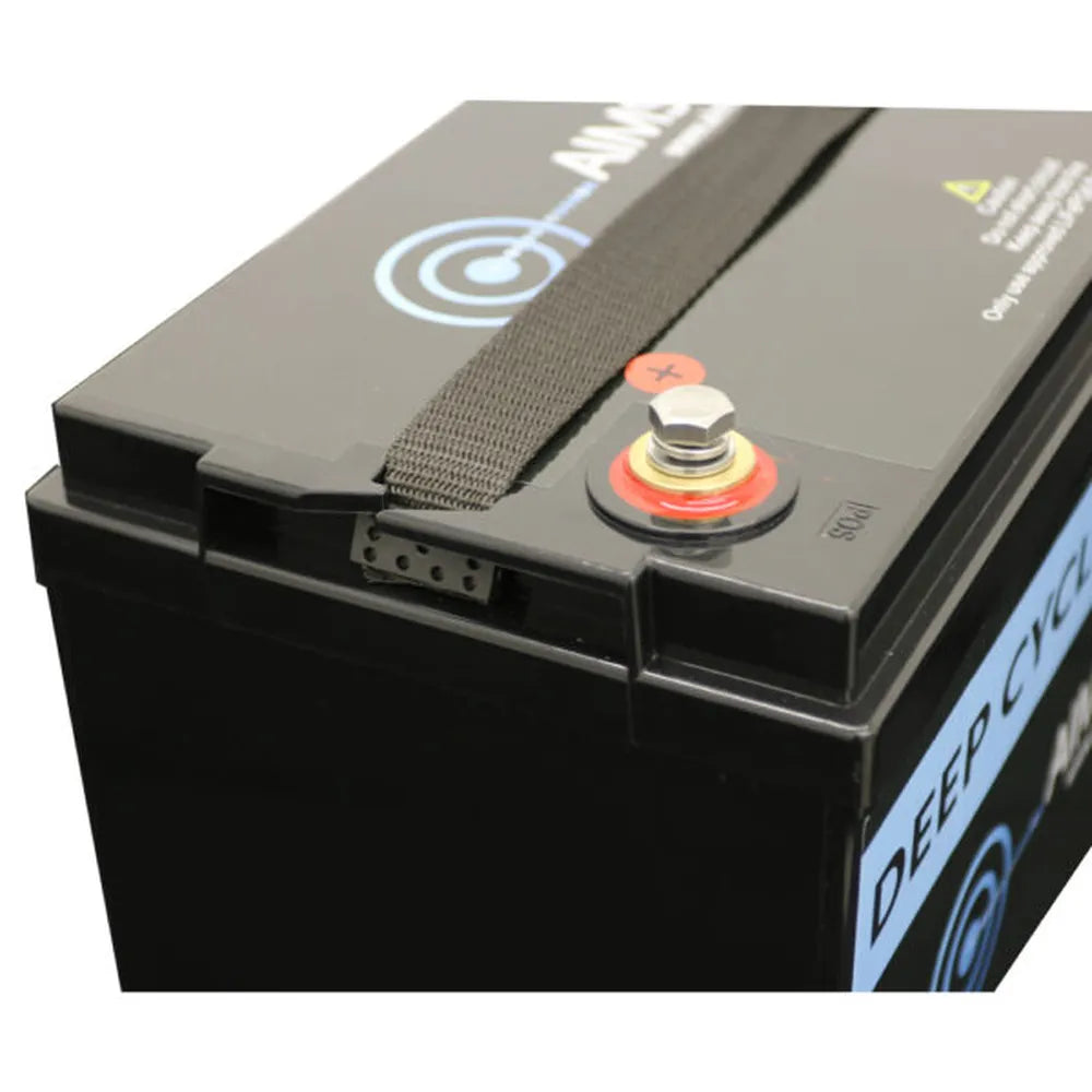 Close-up of AIMS Power 12V AGM deep cycle battery positive terminal, black carry strap, and sealed battery top.