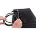 Close-up of AIMS Power foldable solar panel cable storage pocket showing hands handling attached black power leads and connectors.