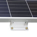 Close-up of a silver Z bracket securely attached to the aluminum frame of a solar panel, showing mounting hardware and bolt placement for roof or RV solar installation.
