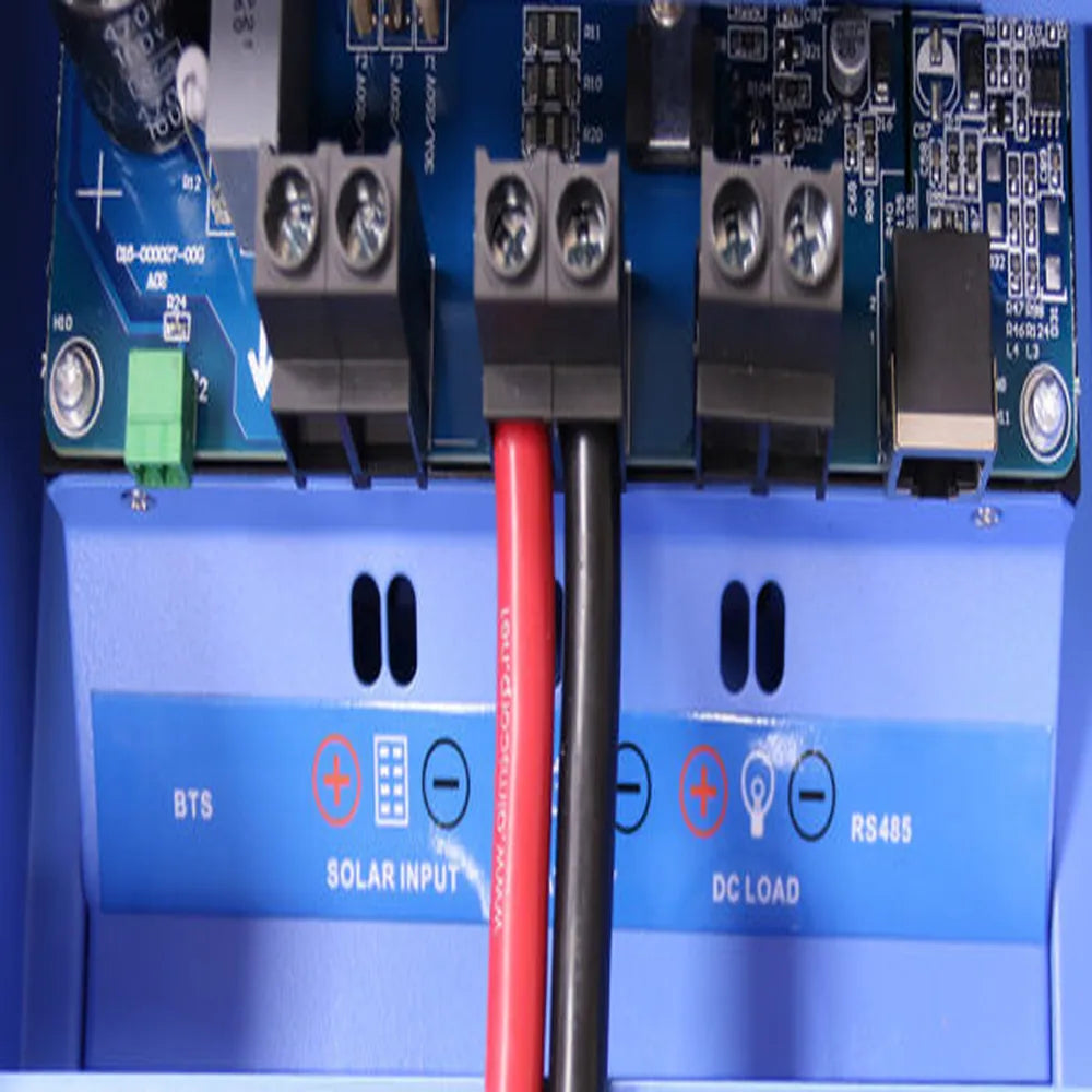 Interior wiring close-up of AIMS Power 40A MPPT solar controller showing terminal blocks, red and black battery cables, solar input, DC load, BTS, and RS485 connection labels.