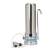 Crystal Quest stainless steel SMART countertop water filter system for arsenic removal including faucet adapter and connector hose.