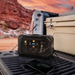 Lion Energy Summit 530W portable power station charging phone outdoors