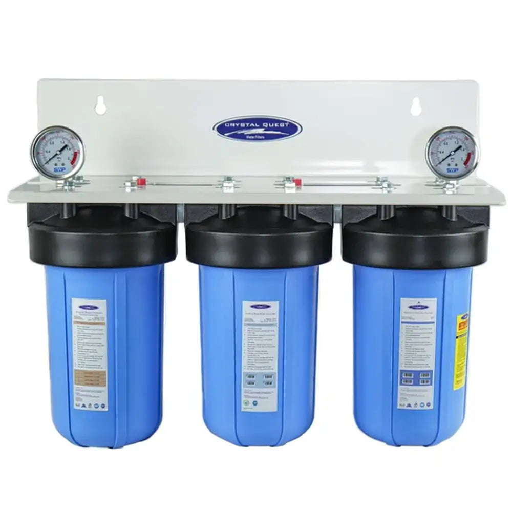 Triple stage Crystal Quest SMART Compact Whole House Water Filtration System with dual pressure gauges and wall-mounting plate.