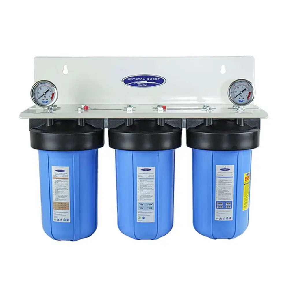 Wall-mounted Crystal Quest 3-stage SMART Compact water filter with 3-6 GPM flow rate, ideal for comprehensive contaminant removal in small homes.